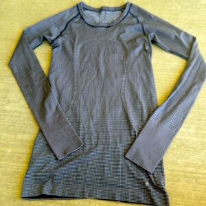 Navy and white striped training shirt, like new, however tags are missing